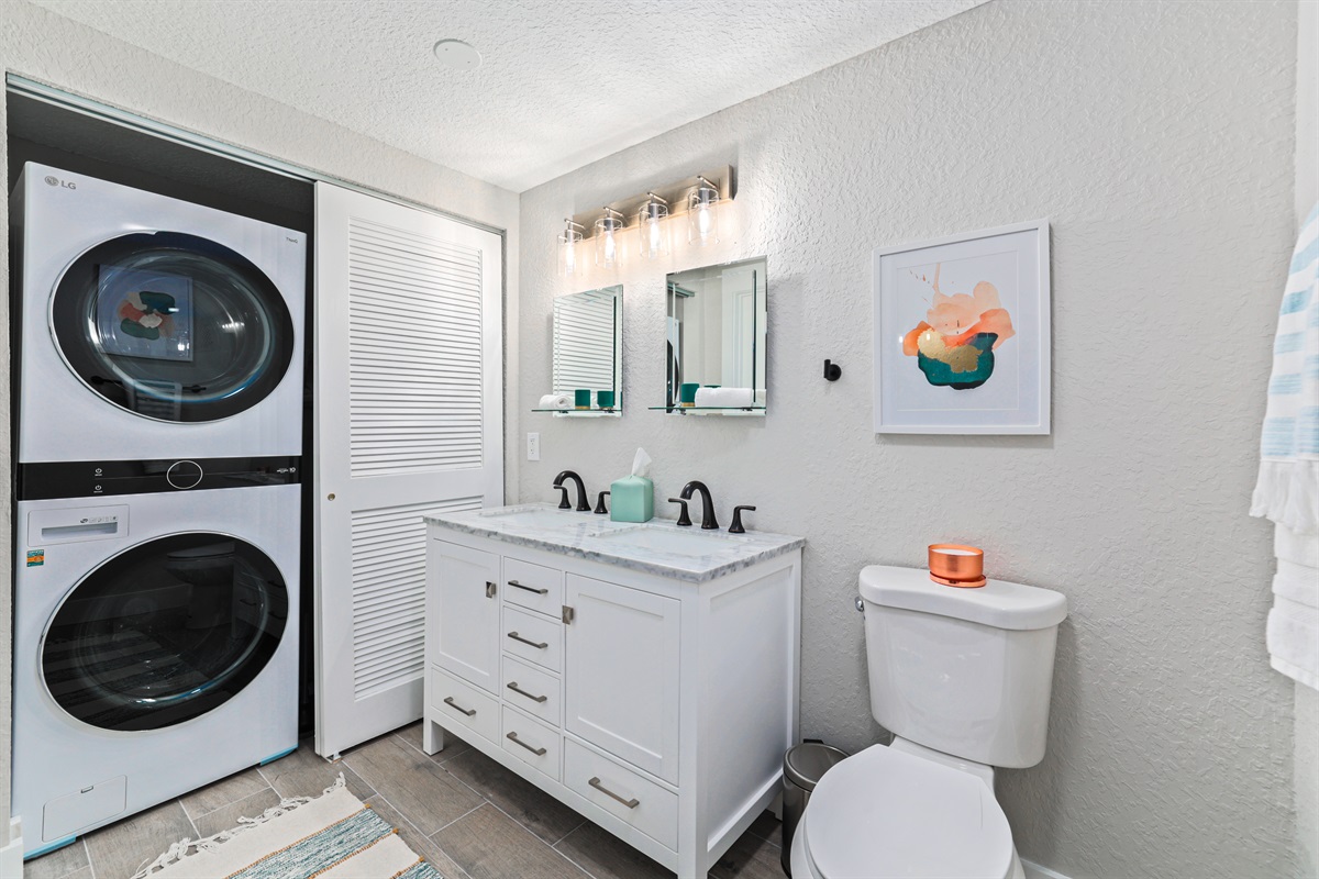 Primary bathroom and dedicated washer and dryer