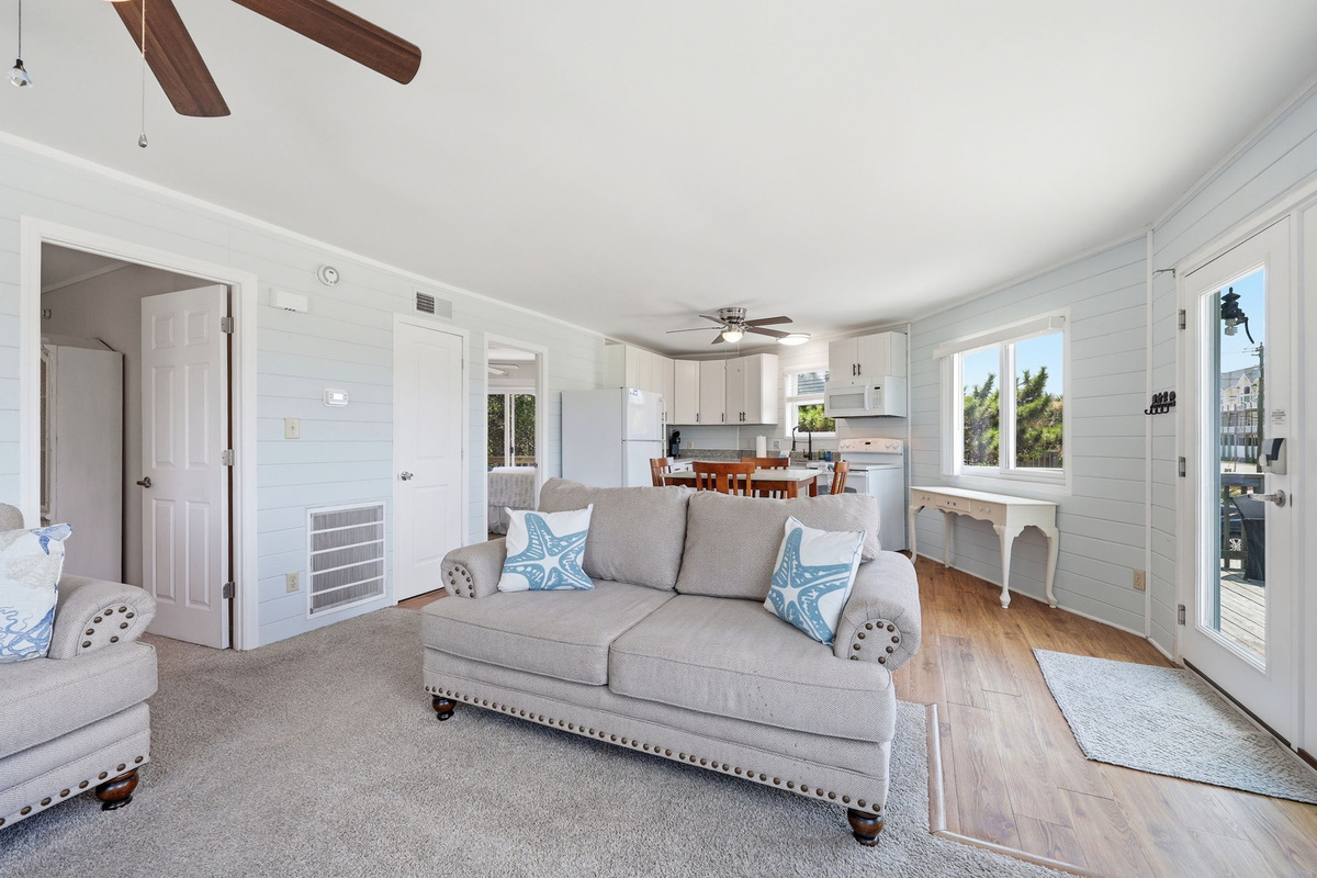 Comfortable seating just steps from the kitchen and deck