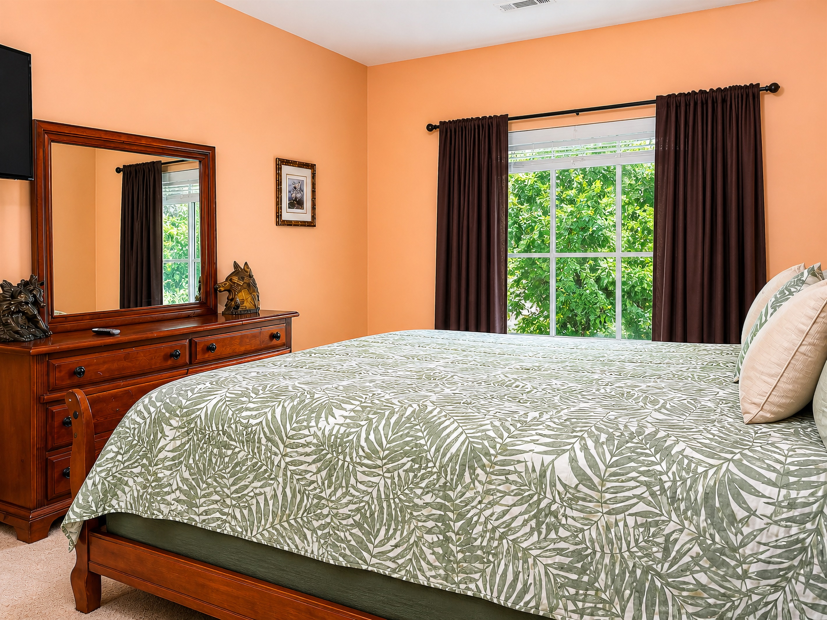Bedroom 6 is large, with a king bed and big picture window for views. We added blackout curtains for those afternoon naps.