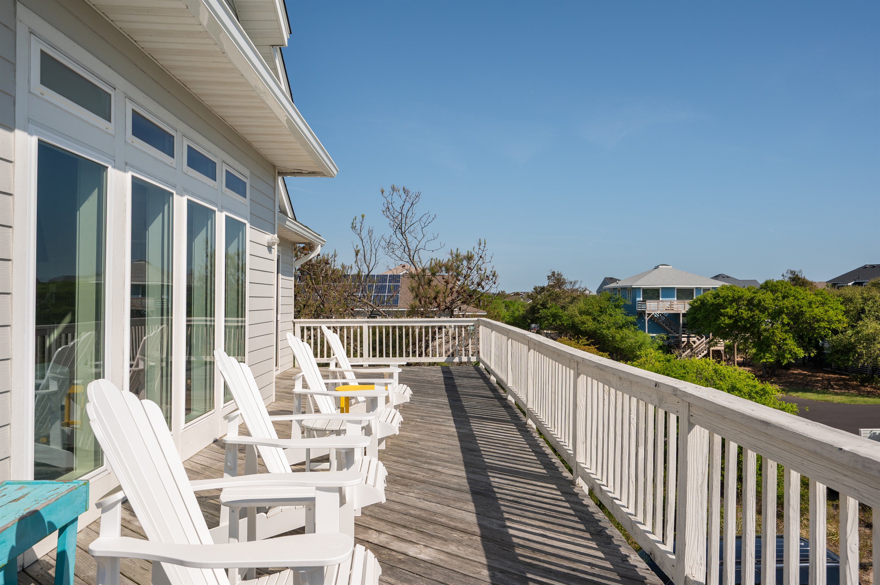 Take in the sunshine and coastal breeze from this spacious upper-level deck.