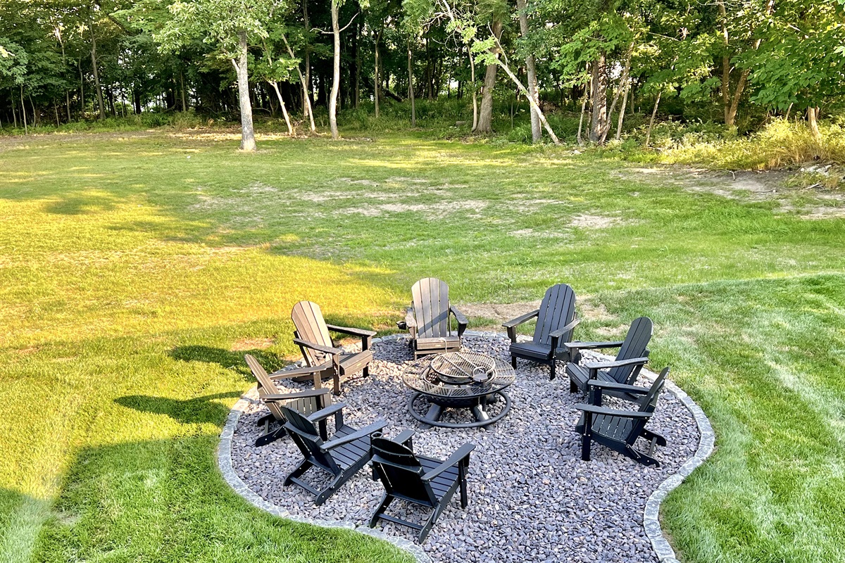 Shared fire pit located just outside the back porch