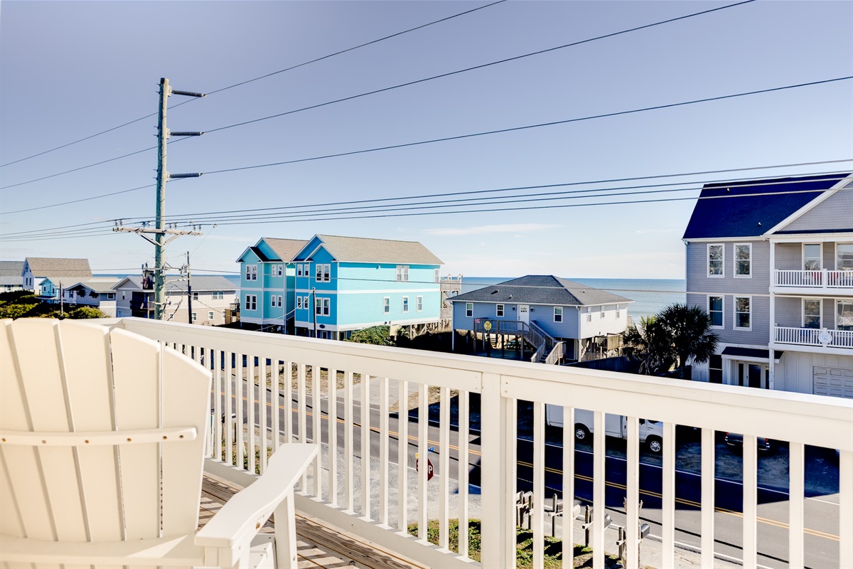 Adirondack seating, fresh sea air, and the perfect spot to watch the day drift by