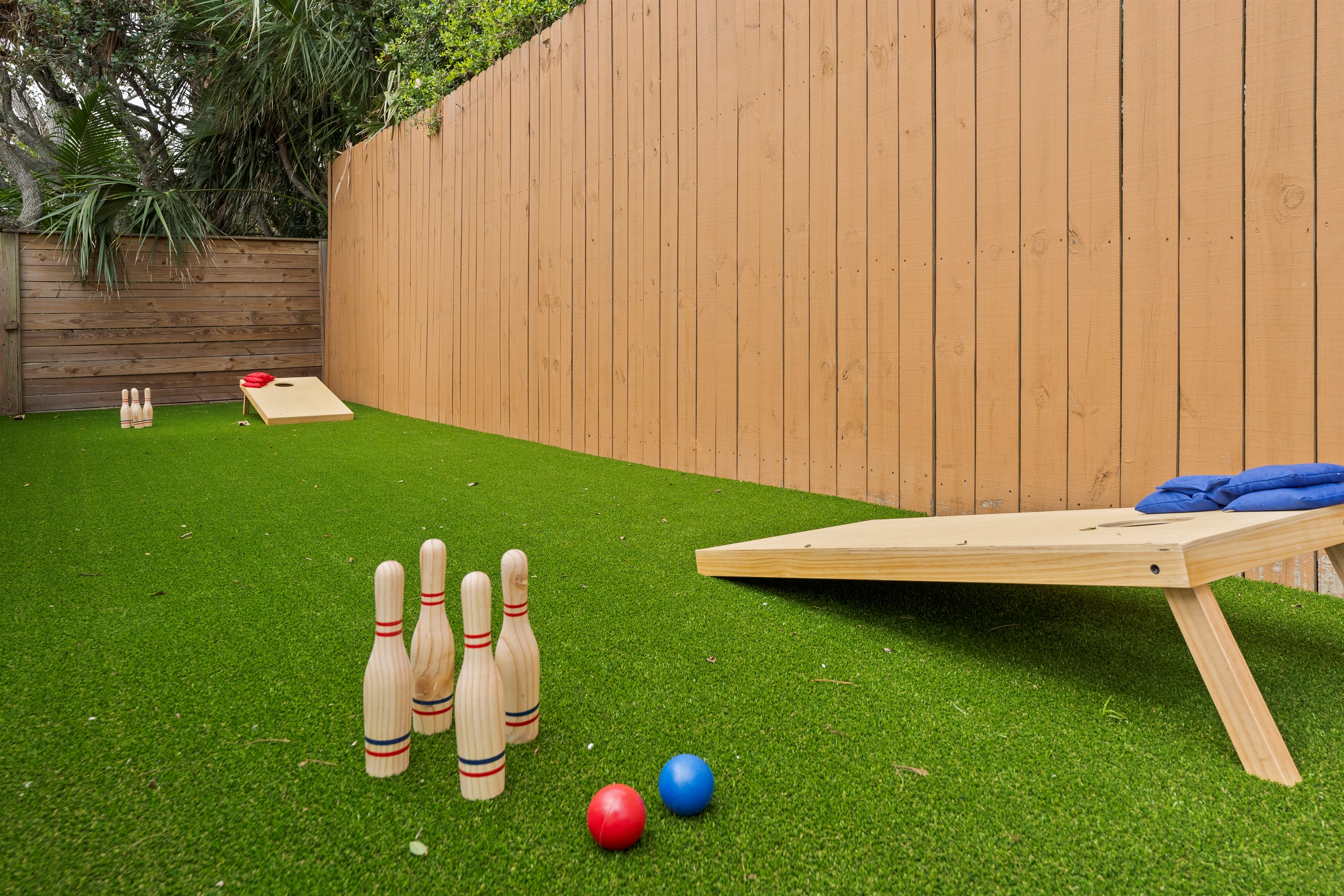 Play Lawn Bowling, Cornhole or ring toss on the lawn games area