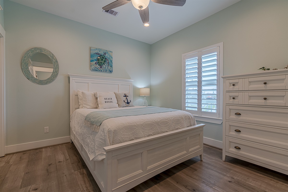 Queen bed on the main floor with a private en-suite.
