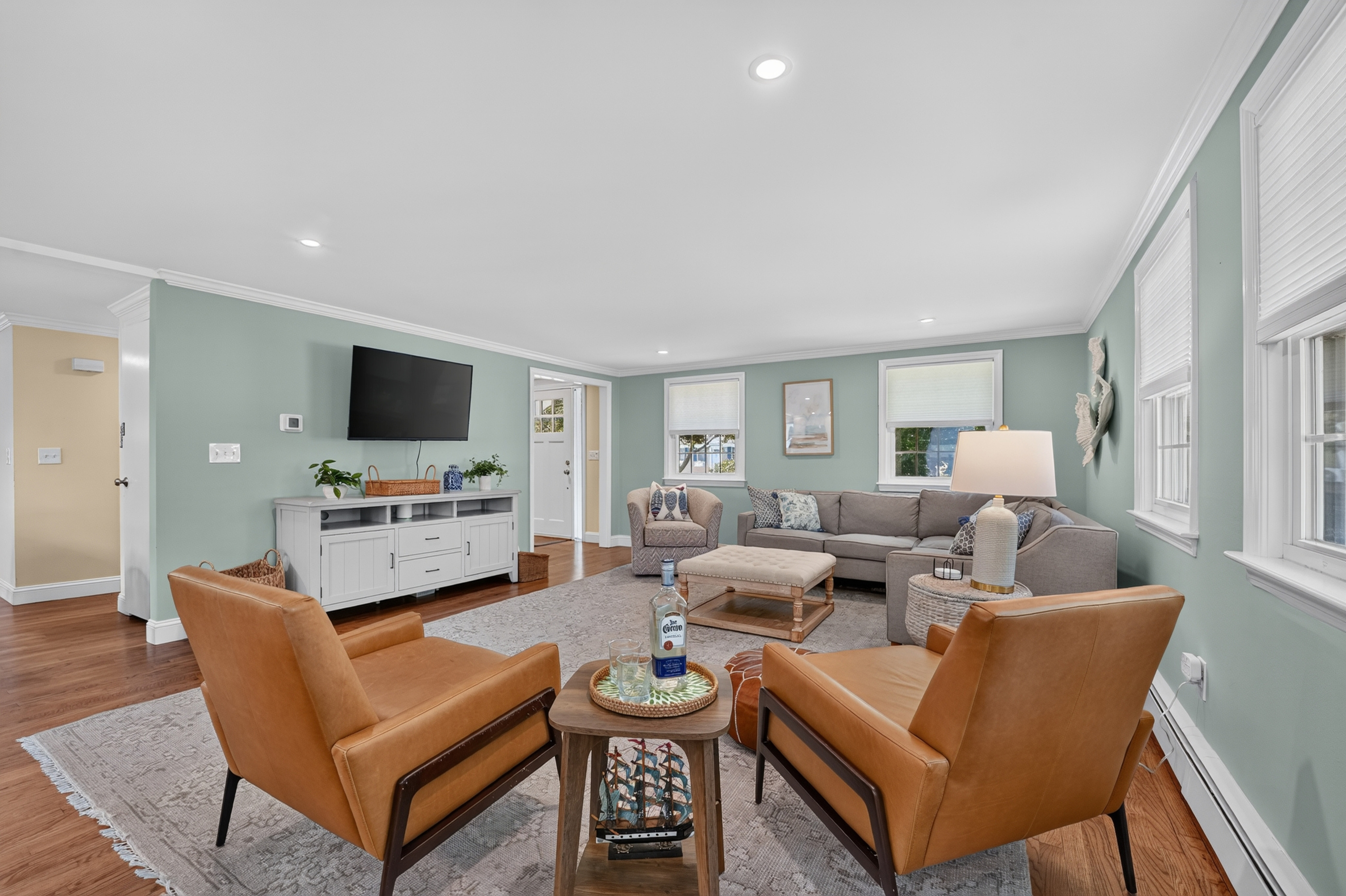 Open living area that flows seamlessly into the kitchen and dining spaces.