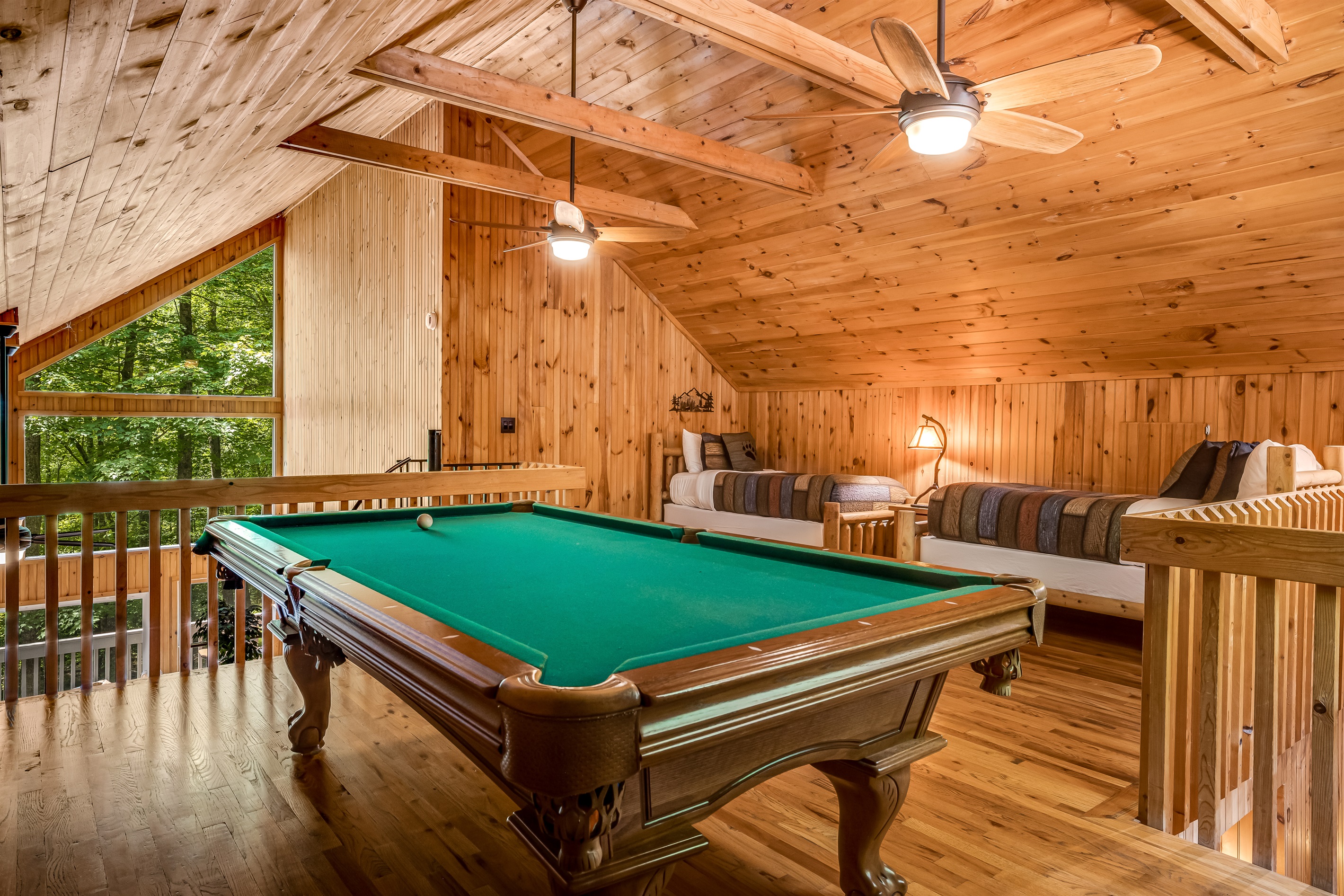 In the loft you will find a pool table and 2 twin beds