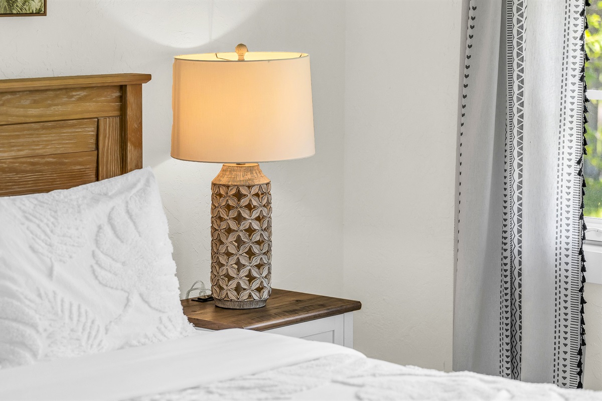 Bedroom 2 offers a relaxing coastal vibe with crisp linens, warm natural light and elegant decor- perfect for guests seeking comfort and tranquility after a day in paradise