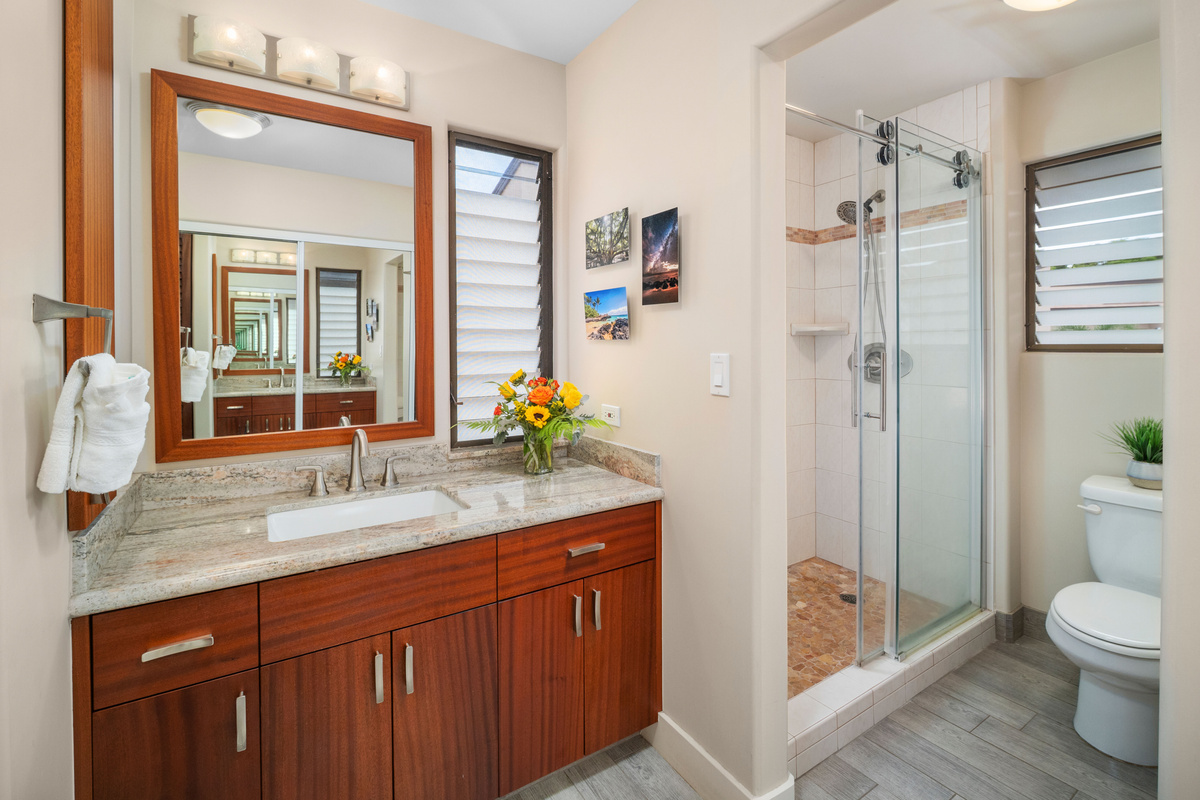 Full bathroom with walk in shower. 