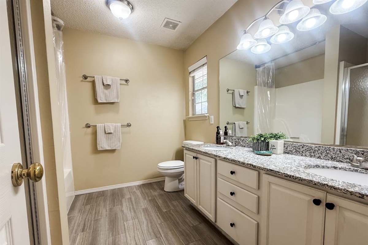 Master Bathroom: Double sinks, stand up shower, & shower/tub combo.