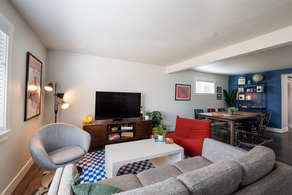 another view of living room and dining area