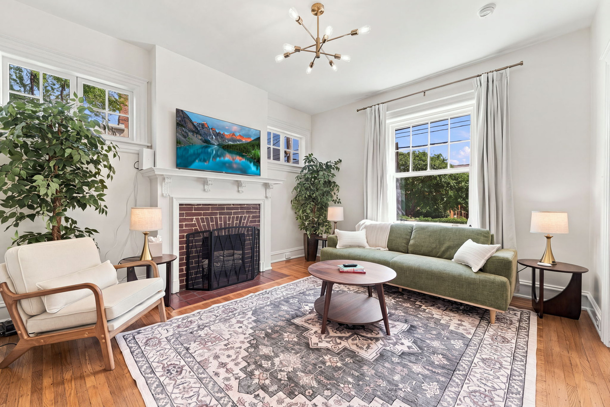 Living Room: Sunlit elegance with chic decor, perfect for relaxation or lively gatherings!