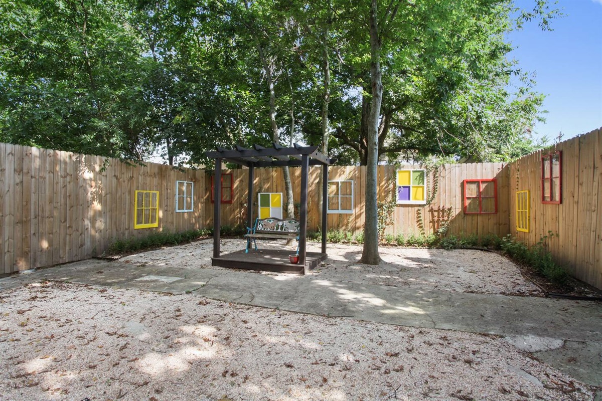 Backyard area.  Charcoal grill not pictured.