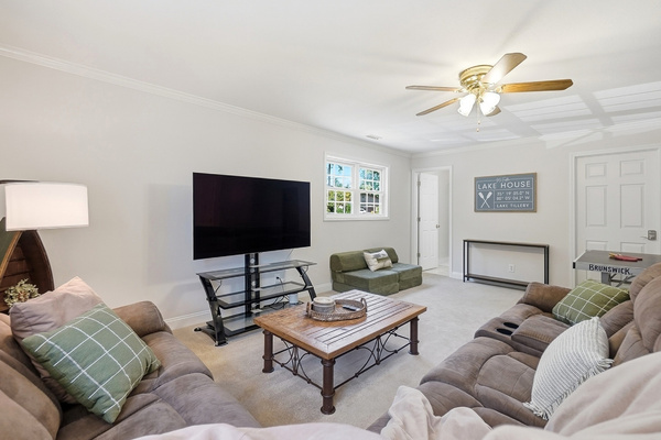 Need a little more room? Head upstairs for another place to lounge, watch TV or hang out.