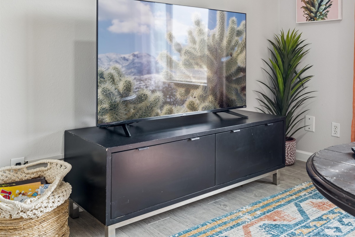 Spacious living room perfect for gatherings and movie nights.