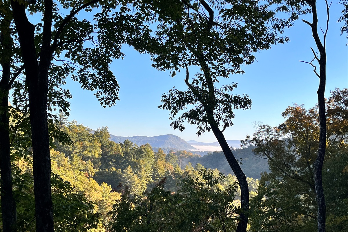Layered mountain views and open sky- the kind of peaceful ridgeline backdrop you never get tired of watching from the deck.
