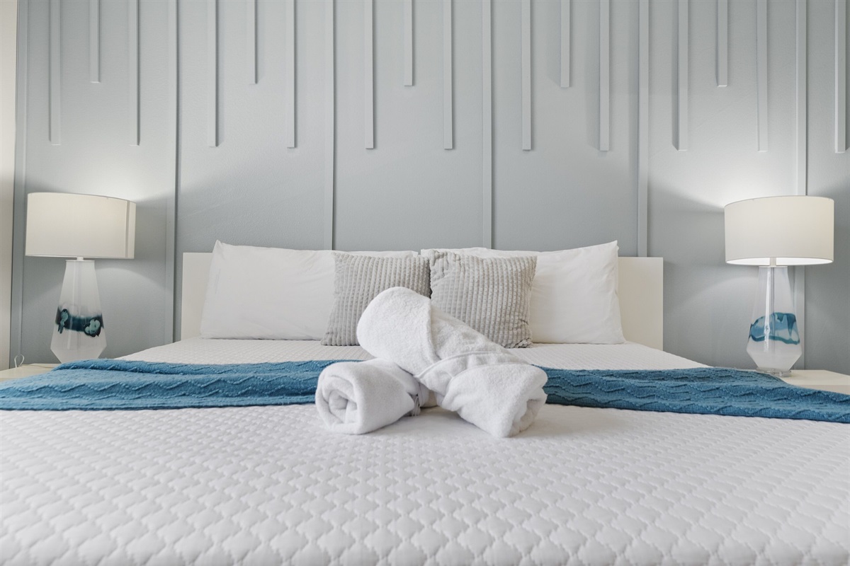 First Floor - This stunning king bedroom is perfect for families, featuring a cozy crib for your little one