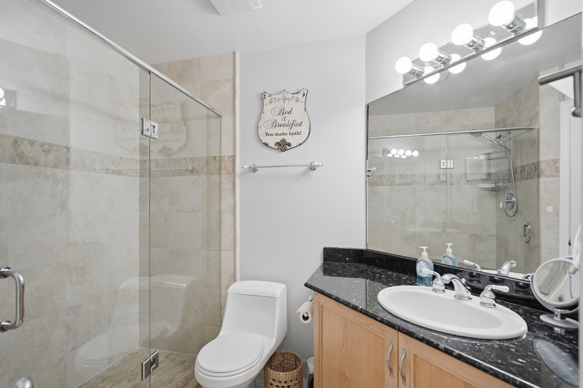 The second full bathroom offers added convenience for guests and provides everything needed to freshen up after a day at the beach or get ready for the next day's adventures.