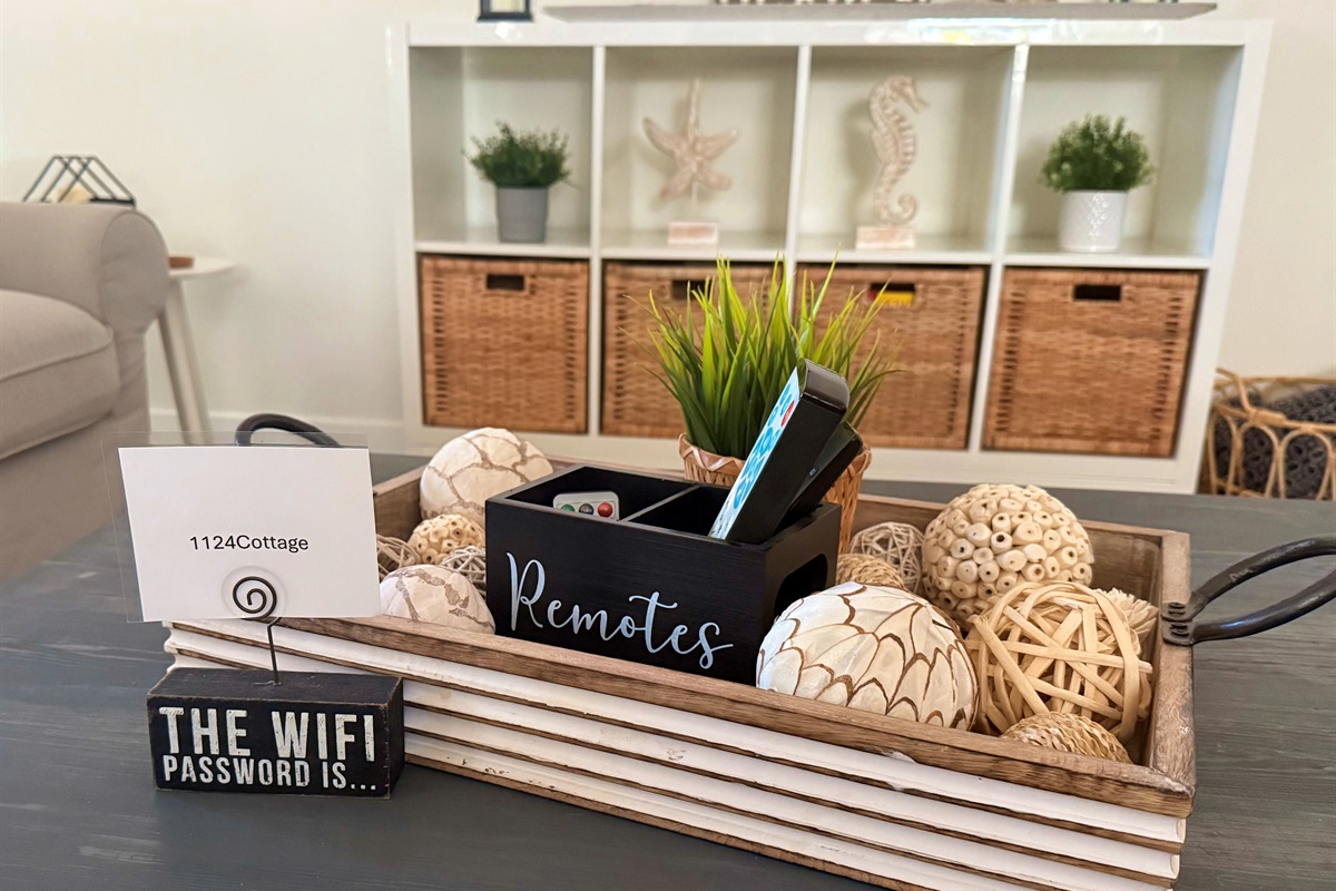 Our coffee table includes a centerpiece to hold those remotes so they don't get lost!