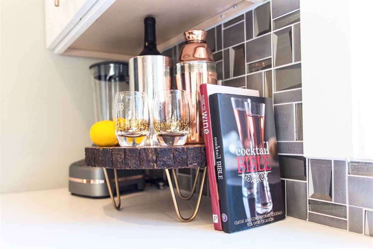- Shake, stir, and sip, your very own cocktail corner is ready to impress - Stocked with glassware, mixers, and a “Cocktail Bible” for inspiration - Perfect spot to unwind with a crafted drink after a day of adventure  