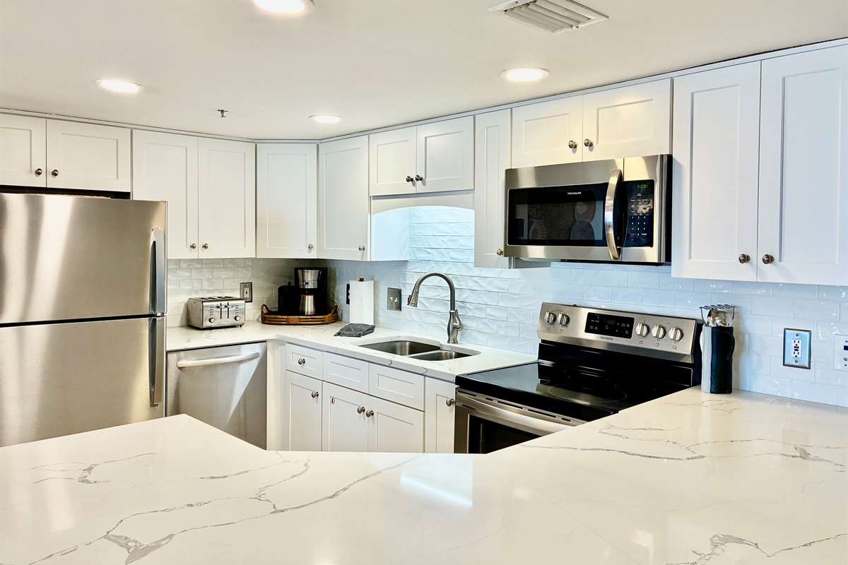 New can lights in the kitchen! So nice and bright!