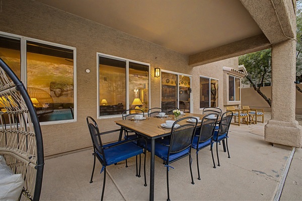 Backyard dining table, egg chair 