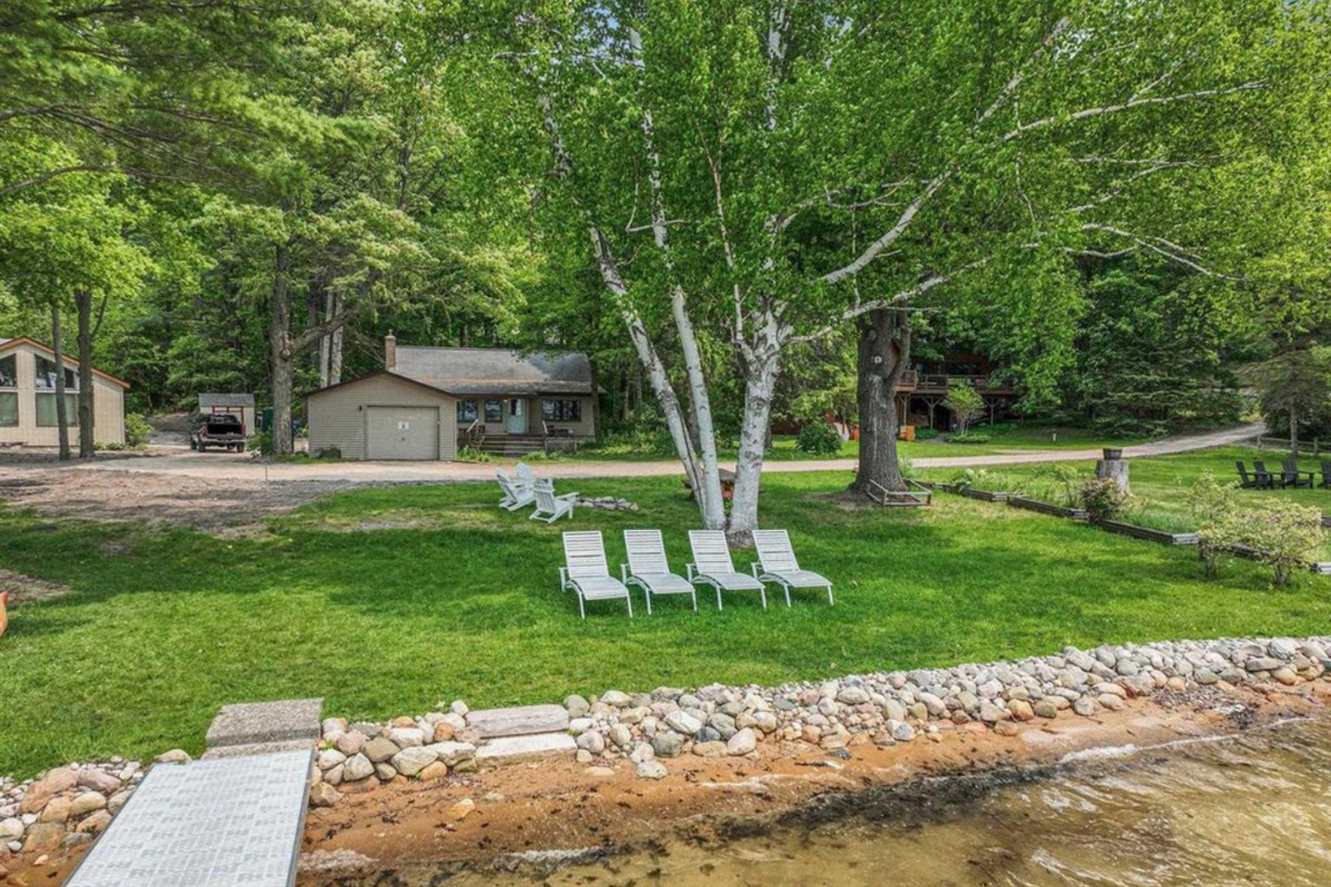 Your private slice of Lake Ann – 100 ft of flat, sandy frontage.