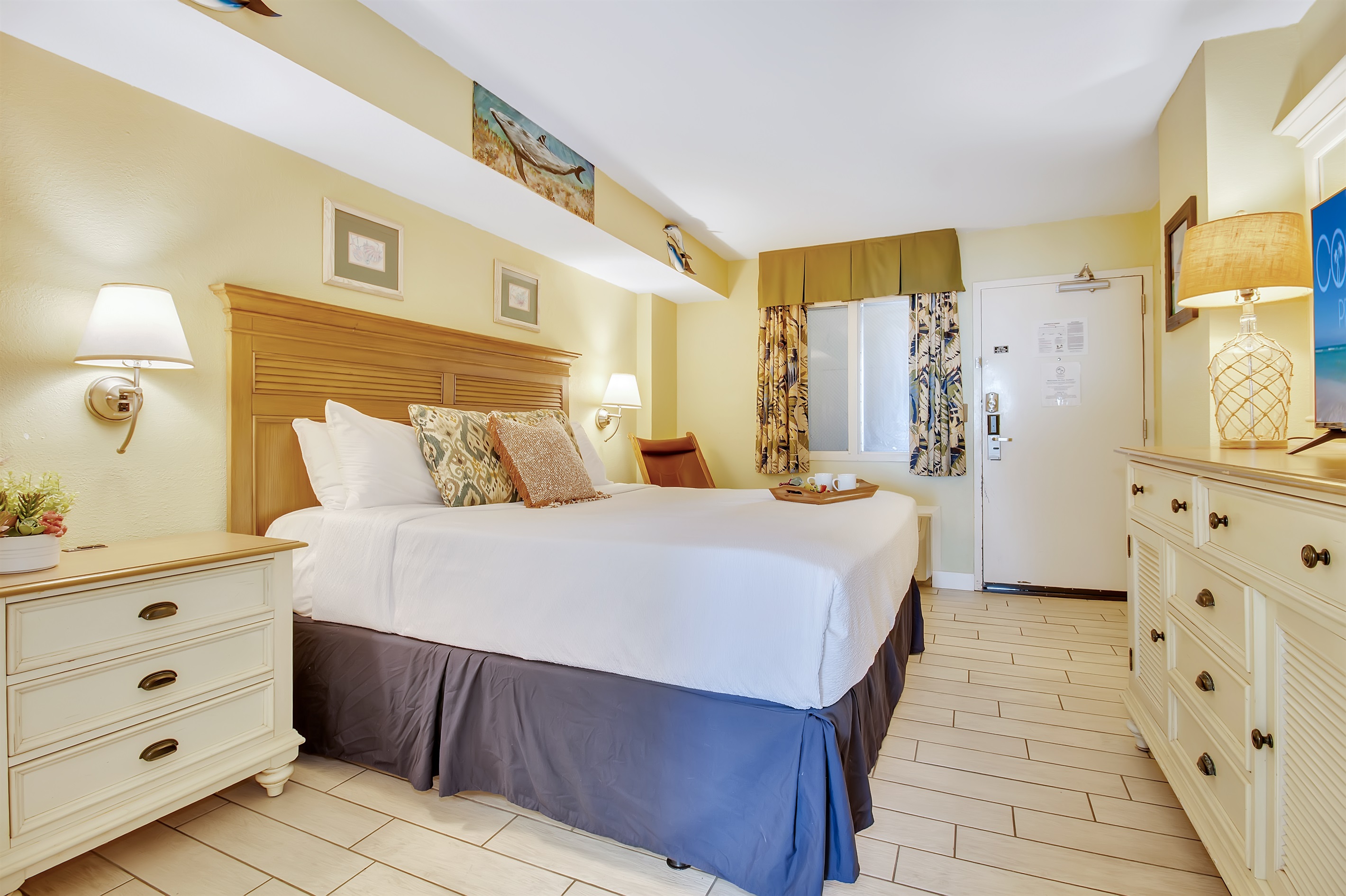 Relax in comfort with soft linens and a calm coastal vibe