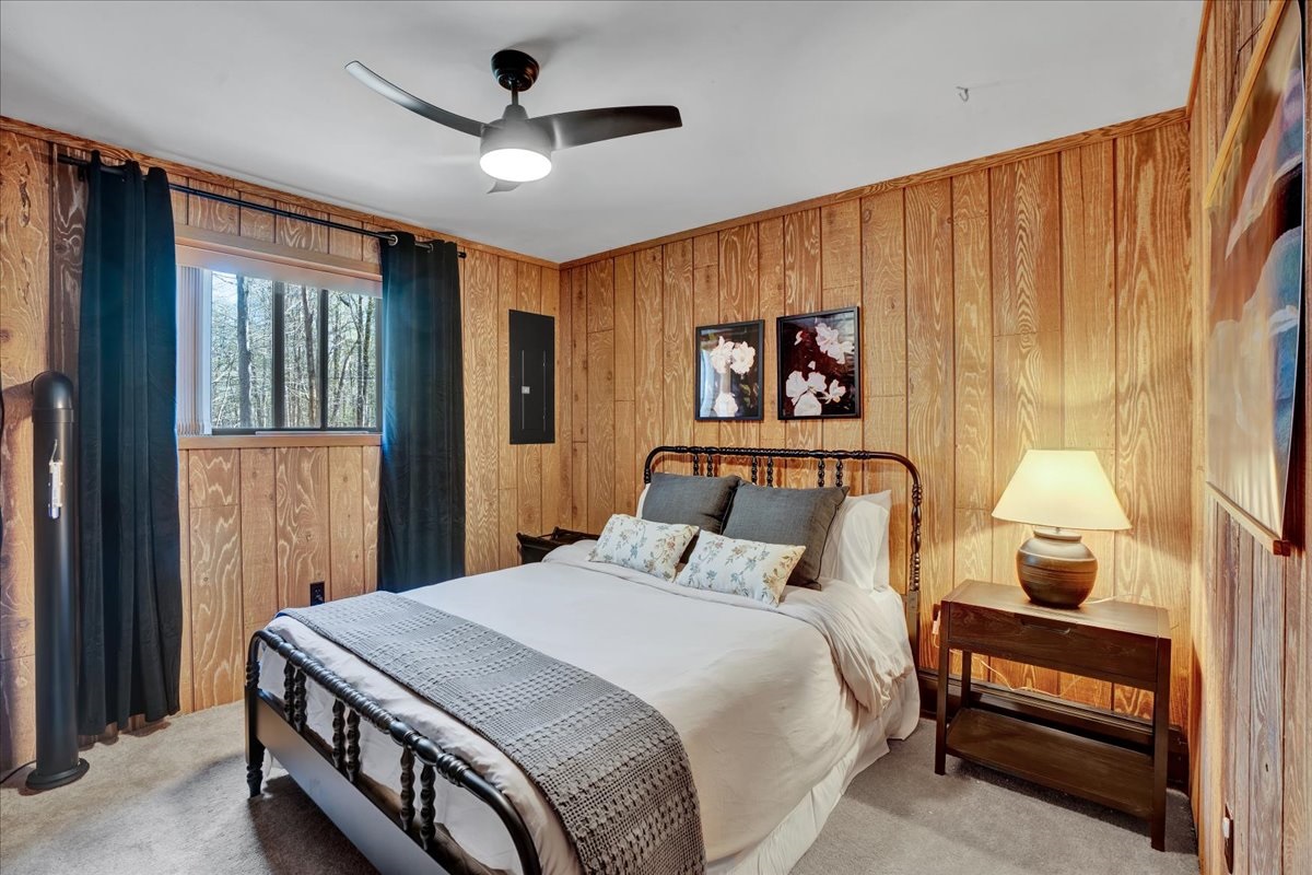 “Comfort and tech combined — Samsung TV, Koble speaker, and soft linens.”