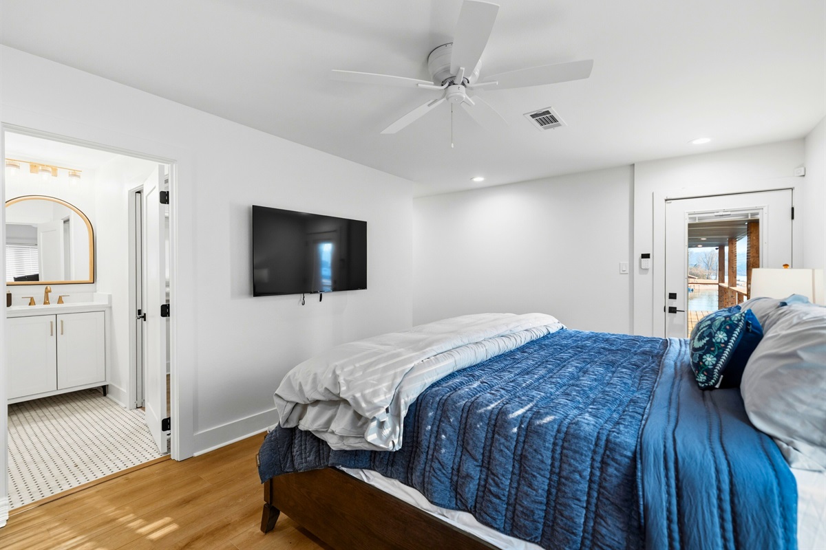 A welcoming guest bedroom provides a comfortable space to settle in, with plenty of room to unpack and feel at home.