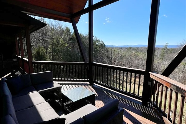 Mountain views from the wrap-around porch, large outdoor couch on the back deck a-frame overlooking the back yard! 