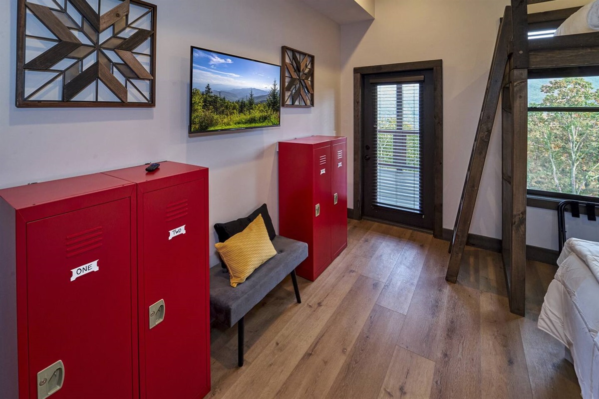 Bedroom with fun storage and balcony access