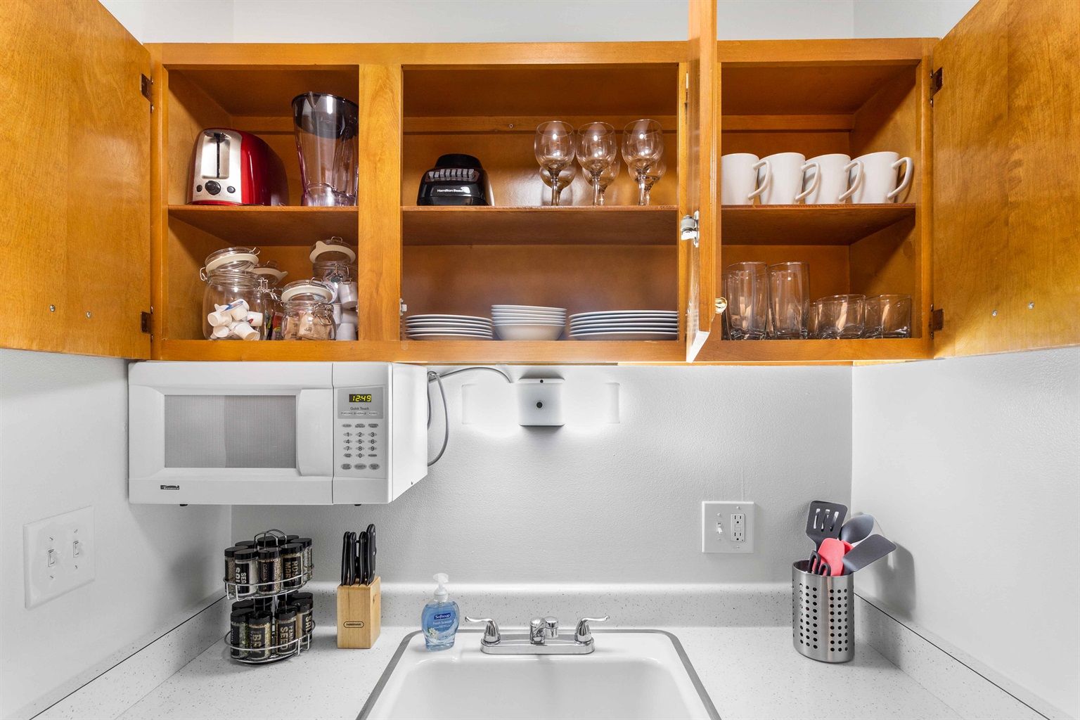 Our kitchen has everything you need for feasting on carry out or cooking a gourmet meal.