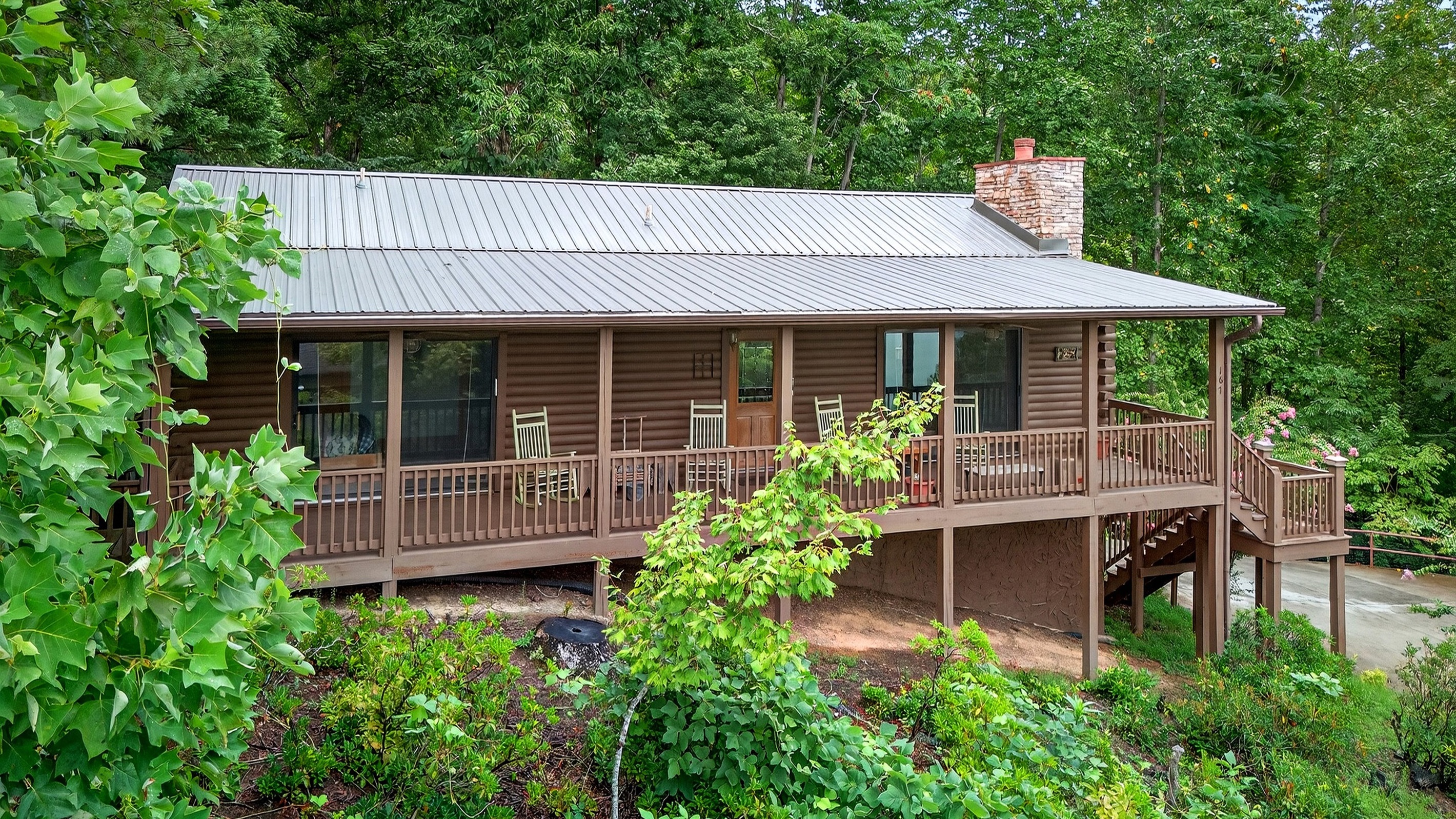 This home features a large, wrap around deck