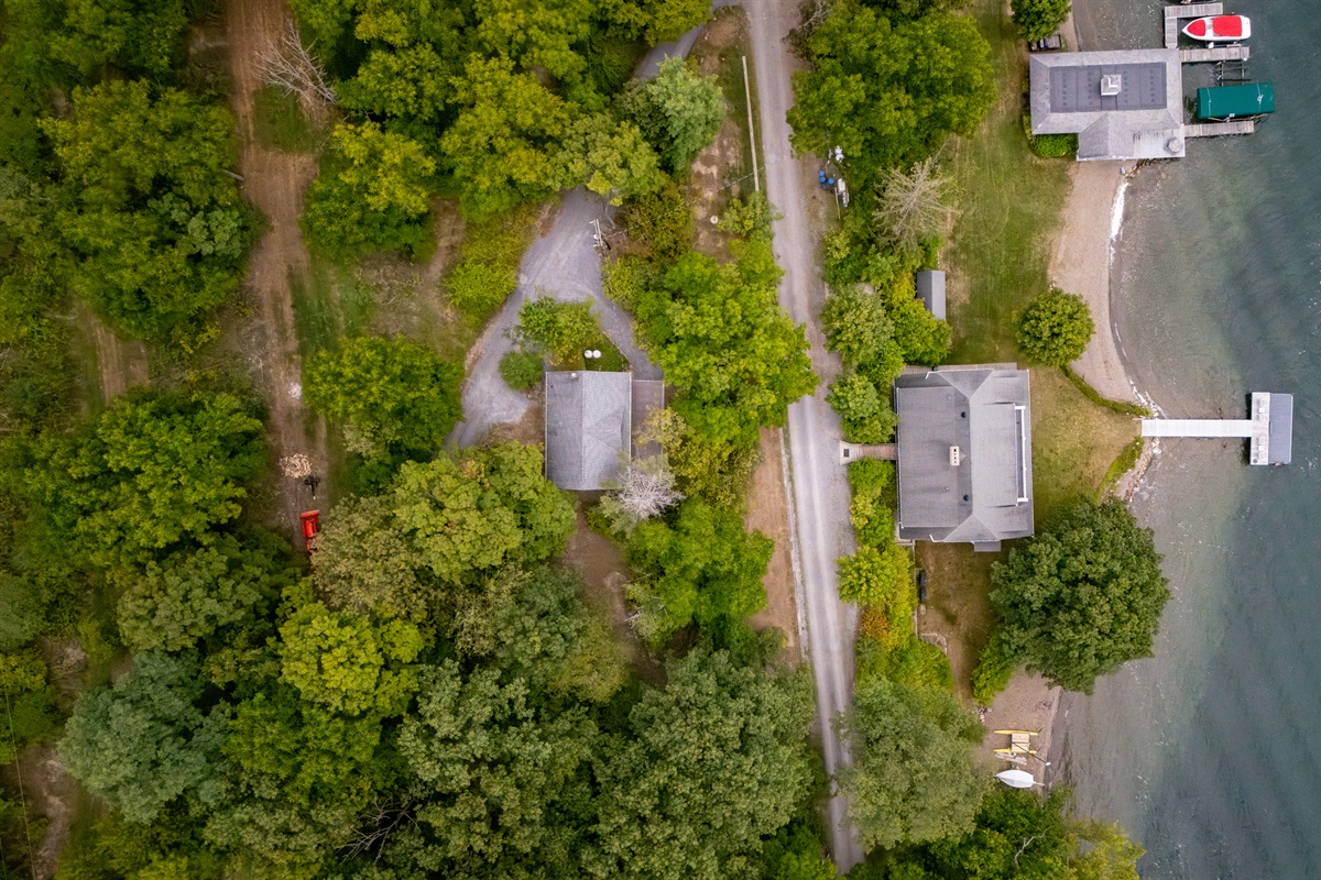 Bird’s-eye view of the property. Please note the bigger house with the dock is not part of this property