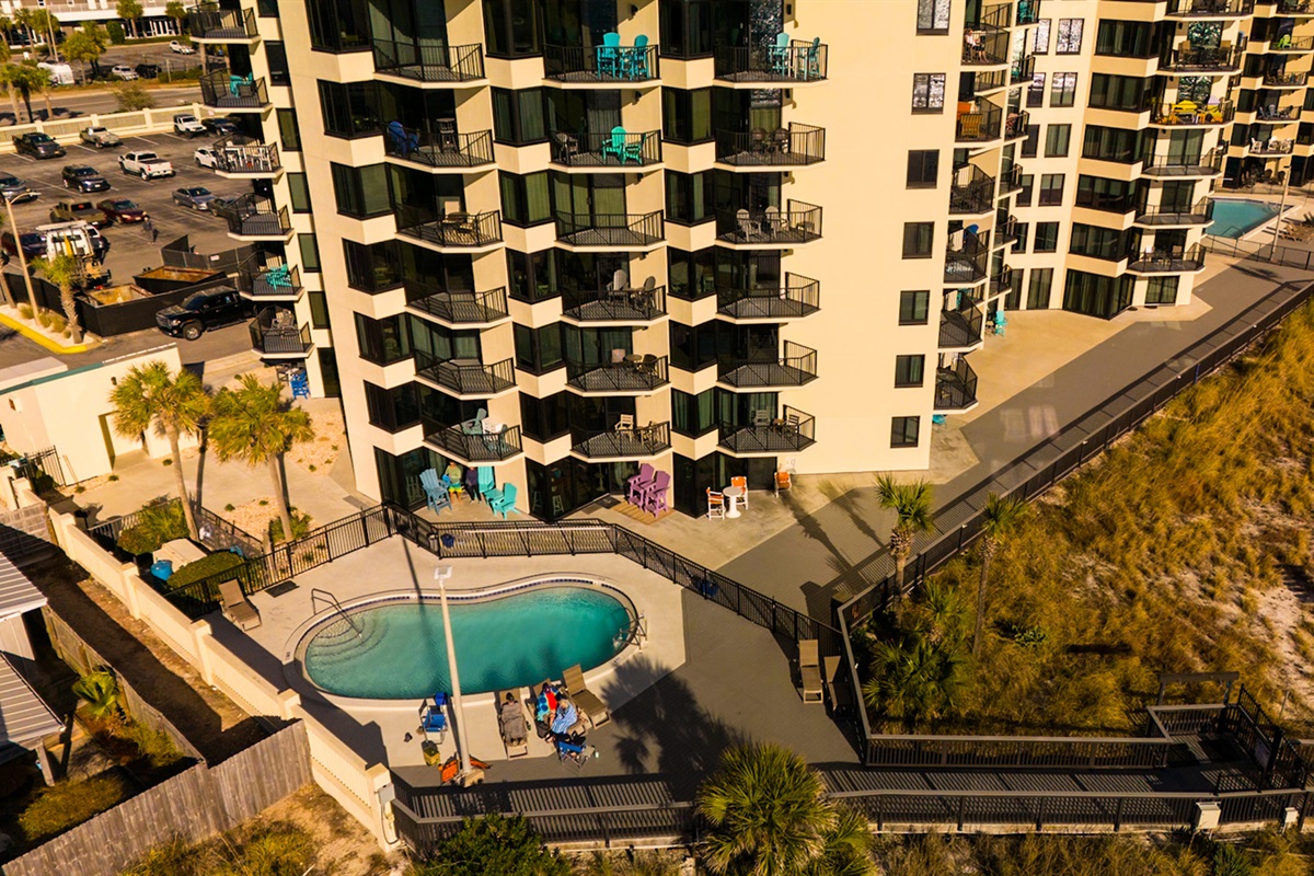 Sunbird's heated west pool w/private gated beach access.