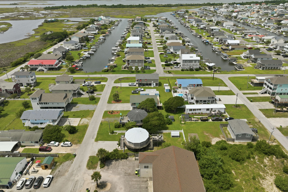 Discover Surf City's unique coastal charm with waterways, marsh views, local dining, shopping, and beach access all just minutes from the home