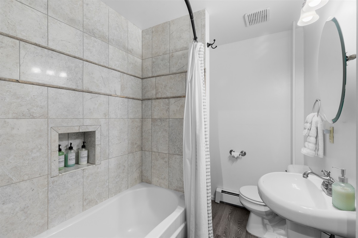 Second bathroom with bath