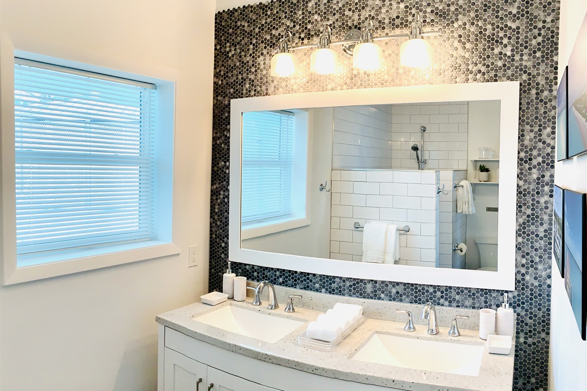 STARFISH BAY Bright master bathroom with double vanity, large shower. We provide shampoo, conditioner, body wash, body lotion, plenty of towels, bath robes and blow dryer