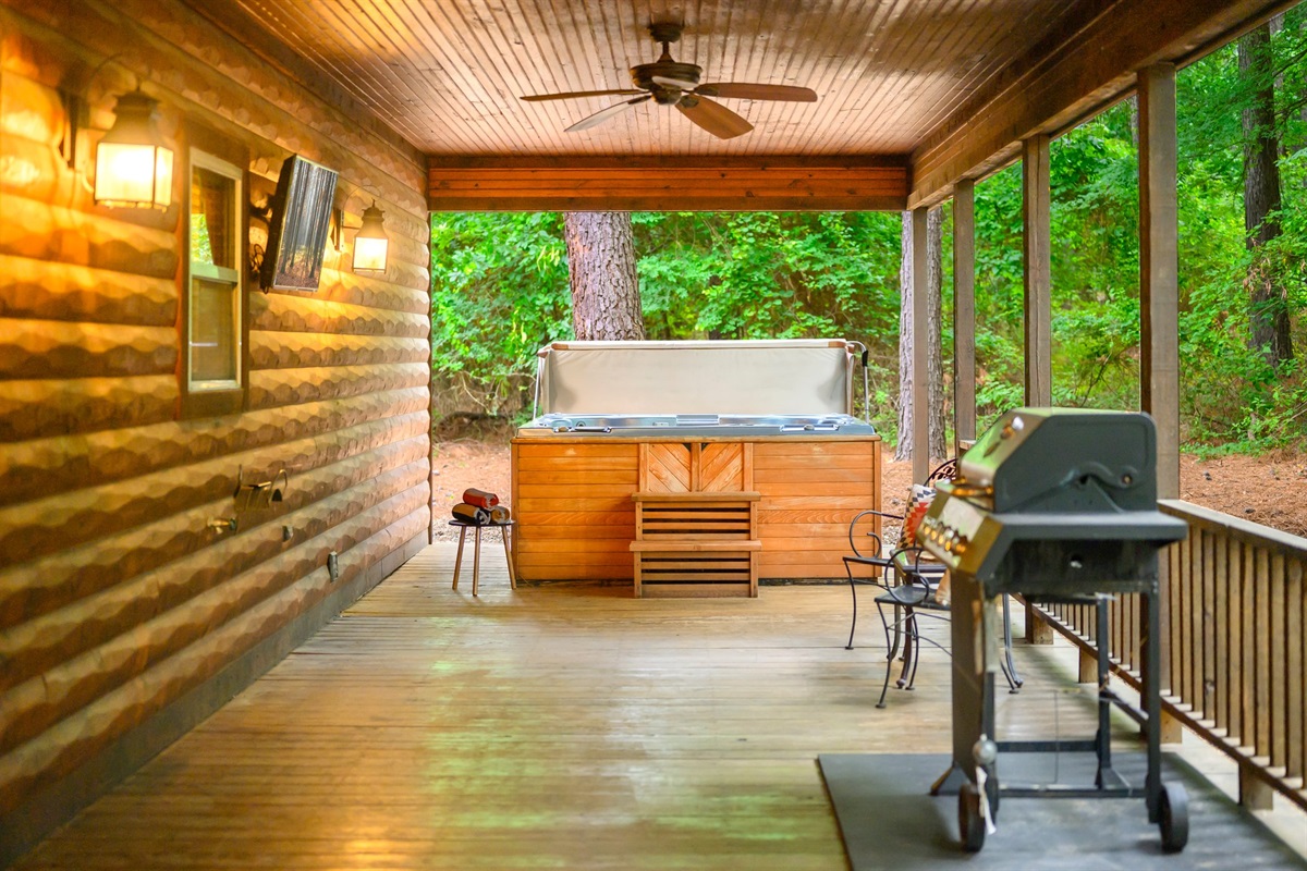 Relax in the hot tub or fire up the gas grill&mdash;this spacious, covered deck is perfect for unwinding or entertaining, rain or shine.
