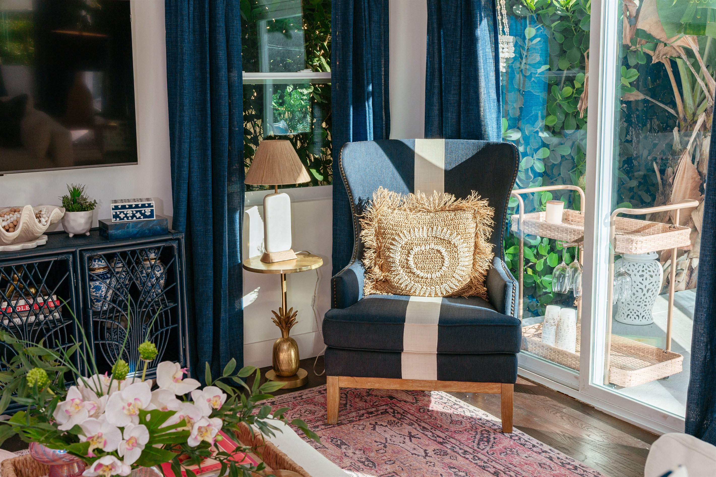 Adjacent to the bar and dining area is the living room, where you can unwind on our comfortable seating.