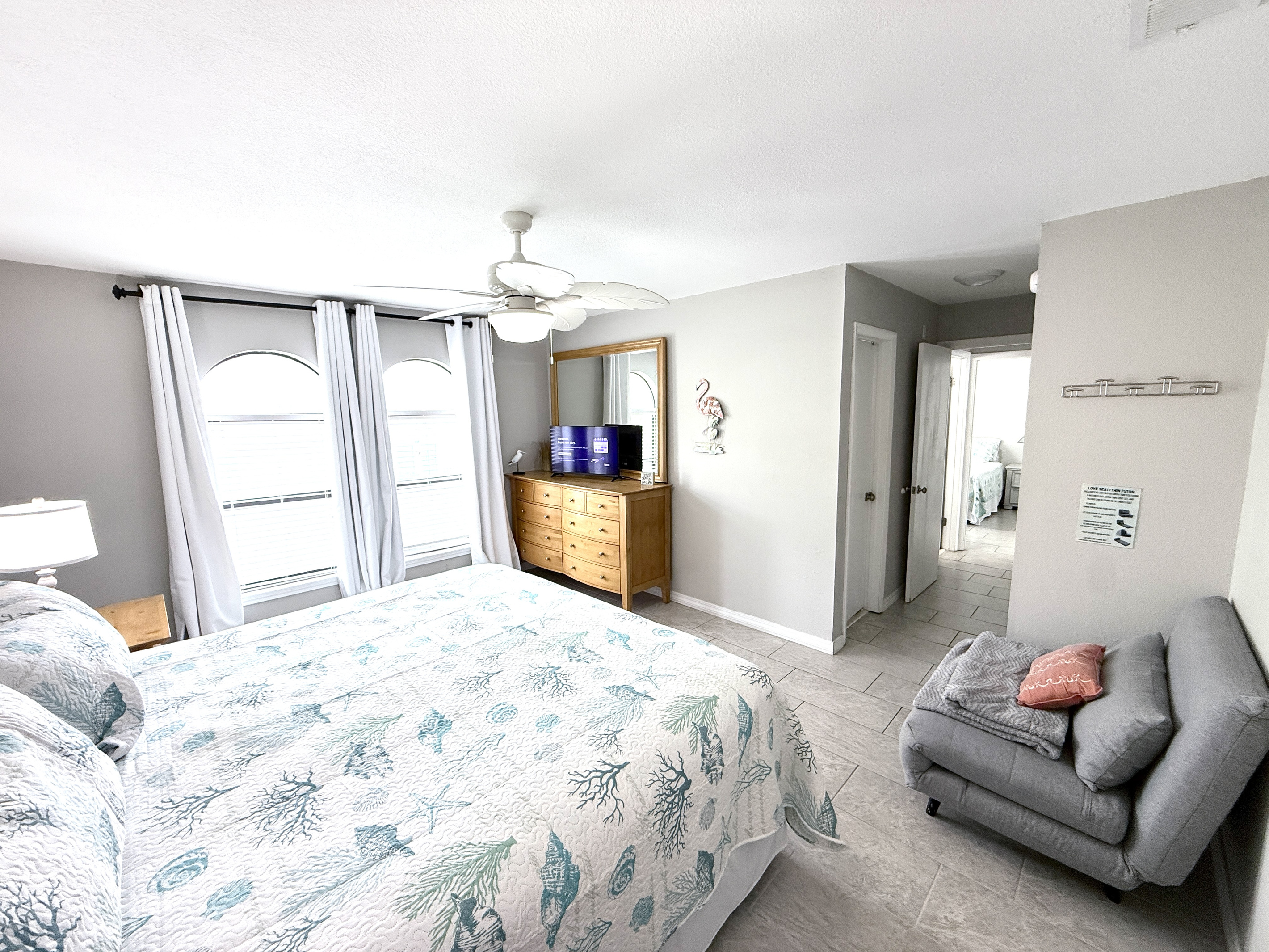 Primary bedroom has a foldout futon for an extra place to sleep