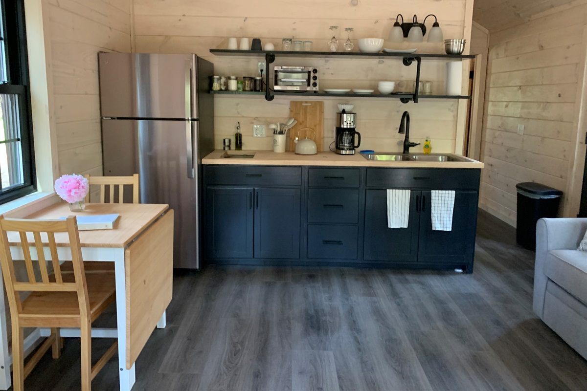 Stocked Kitchen and expandable dinning area