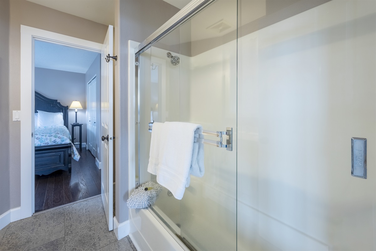 Full bathroom with a soaking tub.