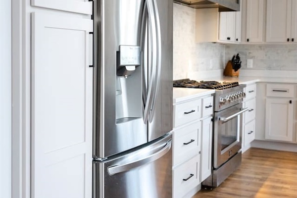Island seats 5 with an additional two stools in the dining area. Kitchen table upgrade coming soon to accommodate even more guests. Plenty of pantry space, kitchen appliances, dishes, mugs, etc.