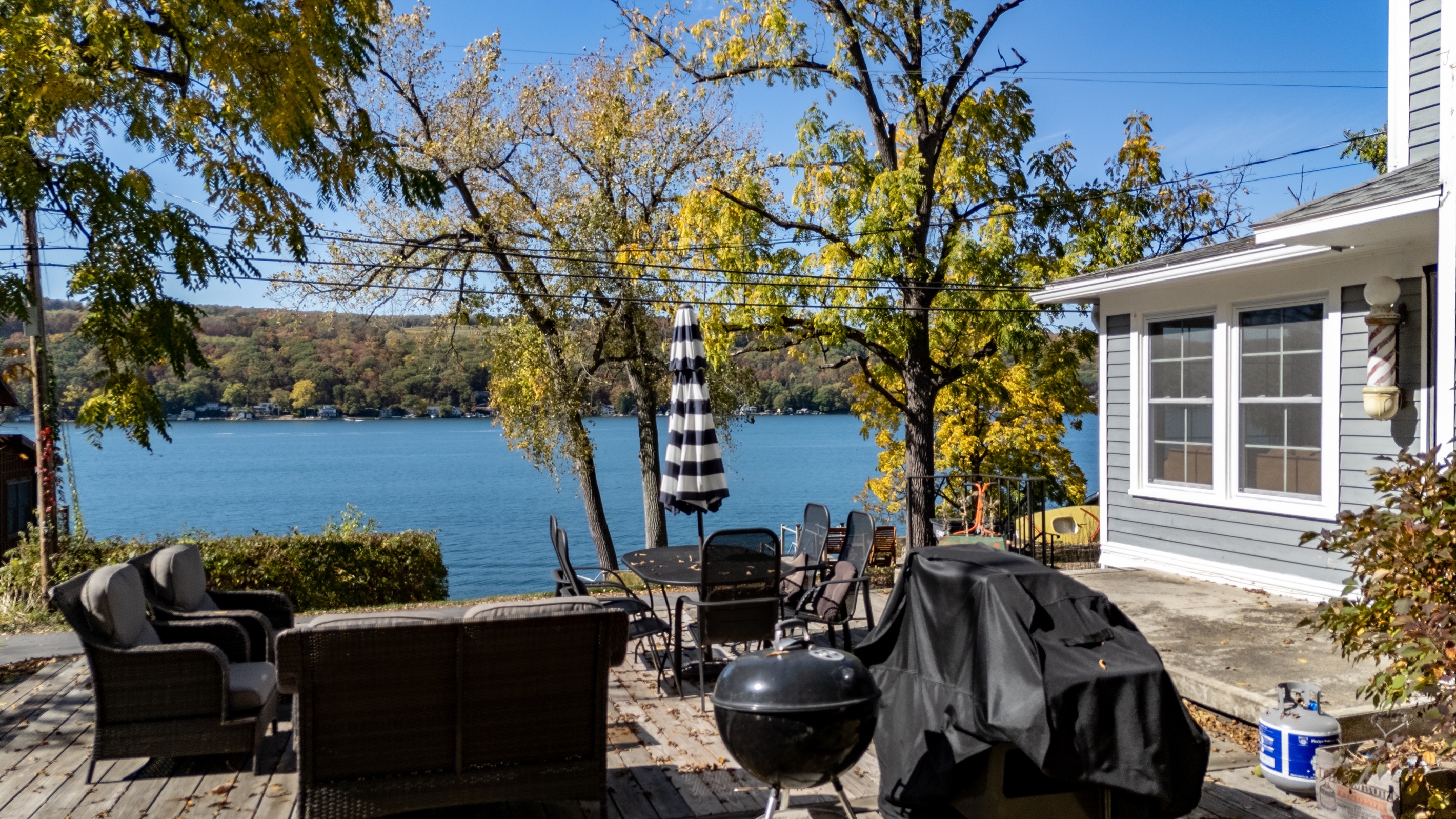 Relax lakeside with breathtaking water views right from the patio — the perfect spot for morning coffee or sunset cocktails.