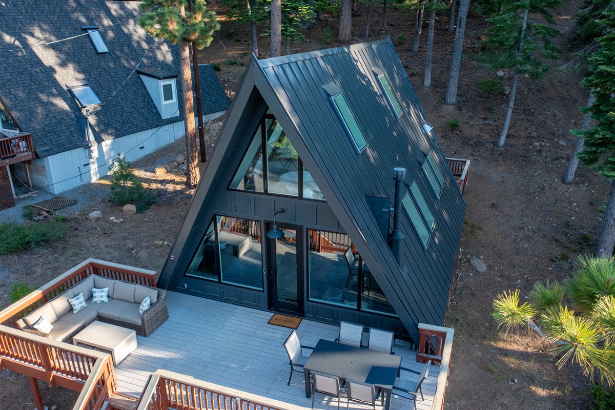 An iconic modern A-Frame with a commanding view of the Lake.