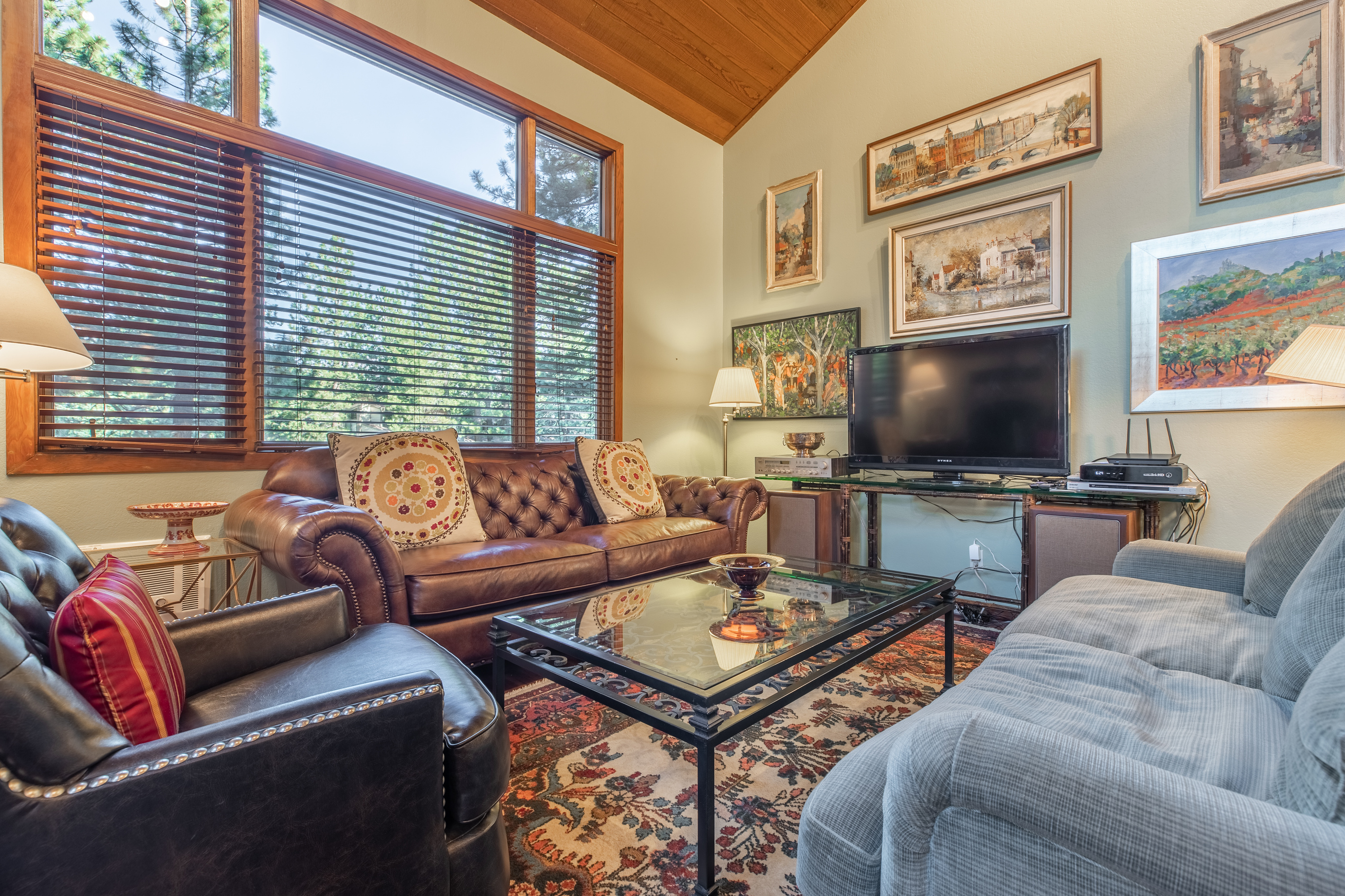 Lots of seating and plenty of natural light.  Keep the blinds down in summer to keep it cool!