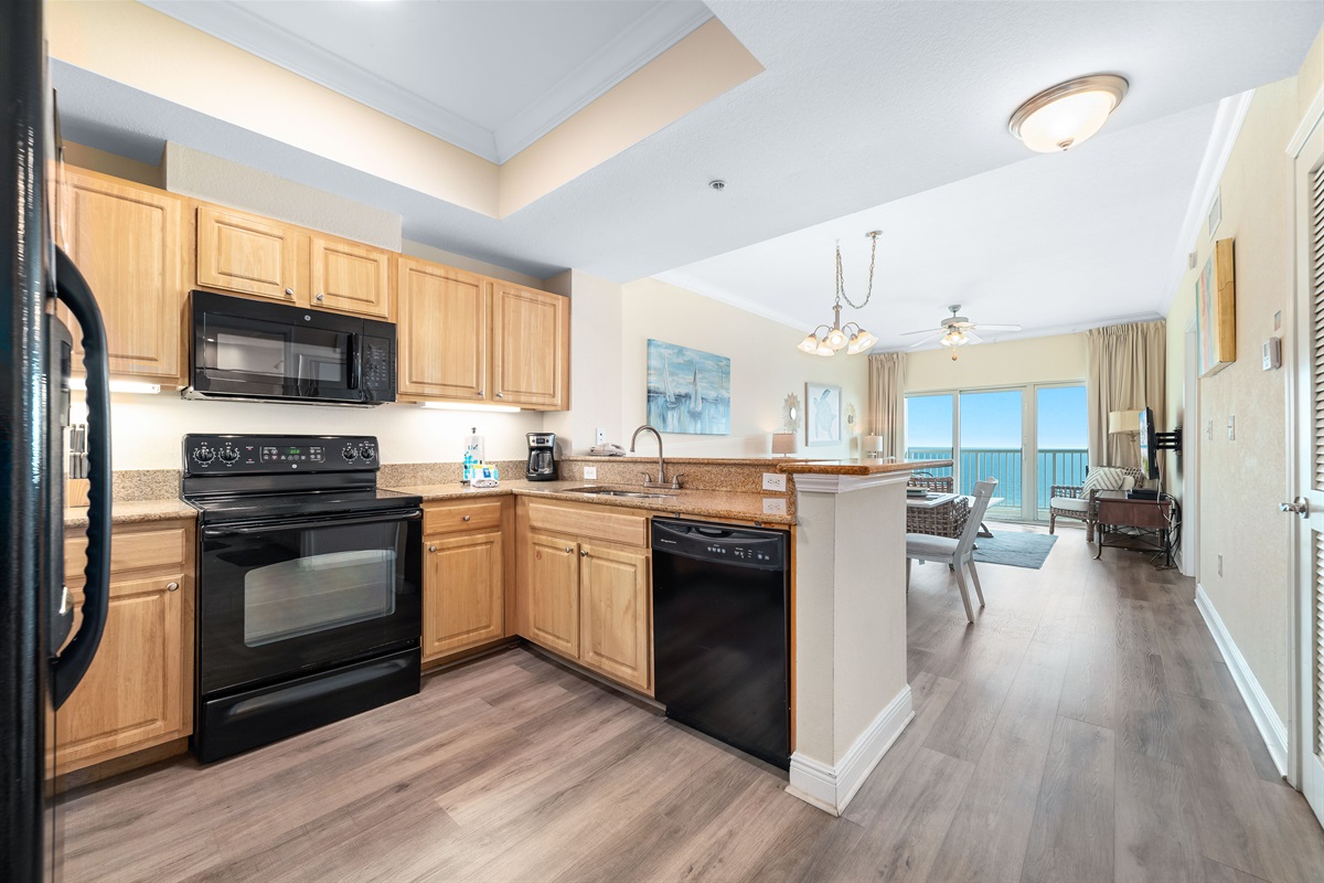 Modern kitchen essentials at your fingertips. This countertop setup offers everything you need for a quick breakfast or a relaxing cup of coffee.