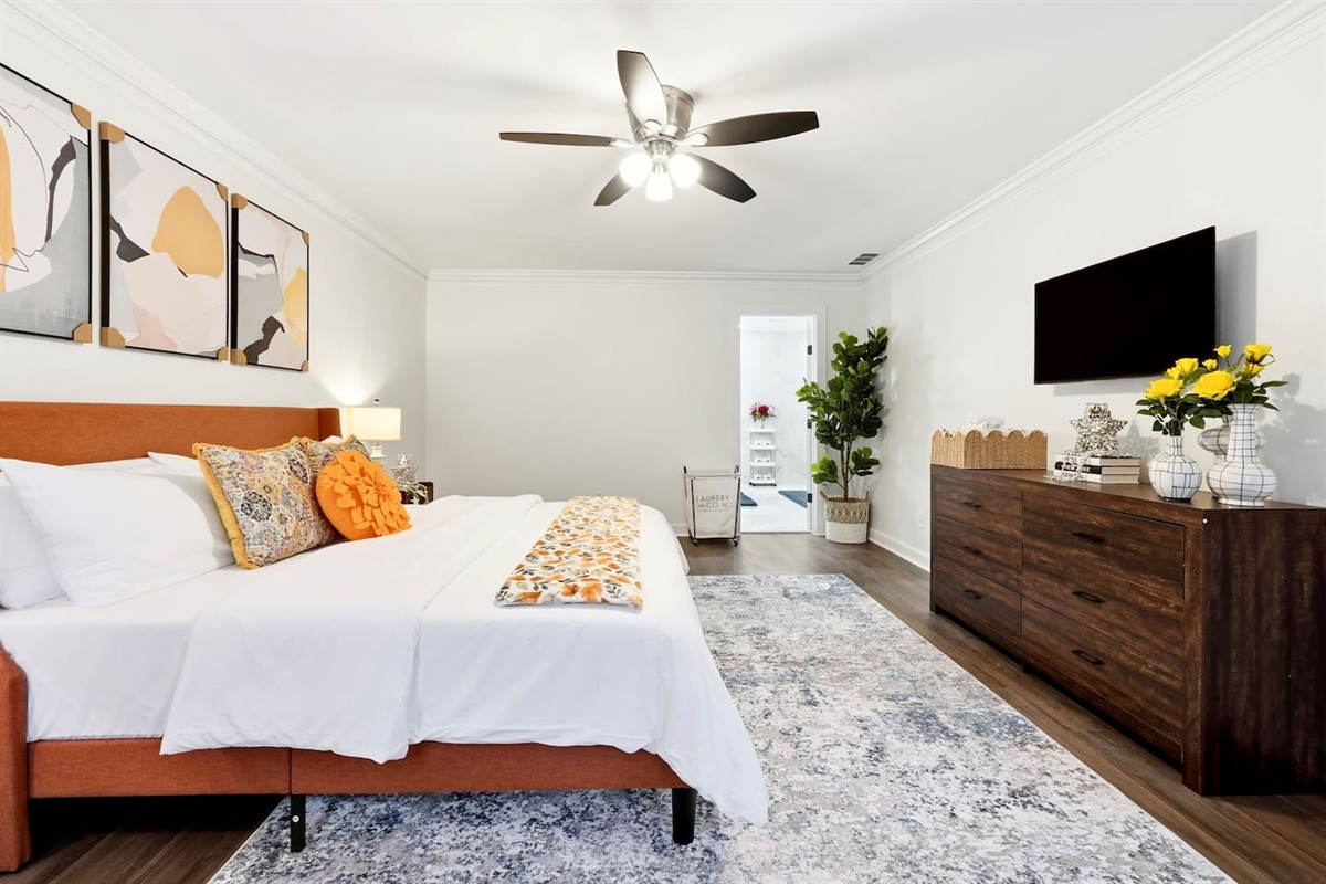 Beautiful second-level master bedroom featuring a king bed, a Roku-powered Smart TV, and located all the way to the right at the top of the staircase. This room includes 2 full-body towels, 2 washcloths, and 2 hand towels for your stay.