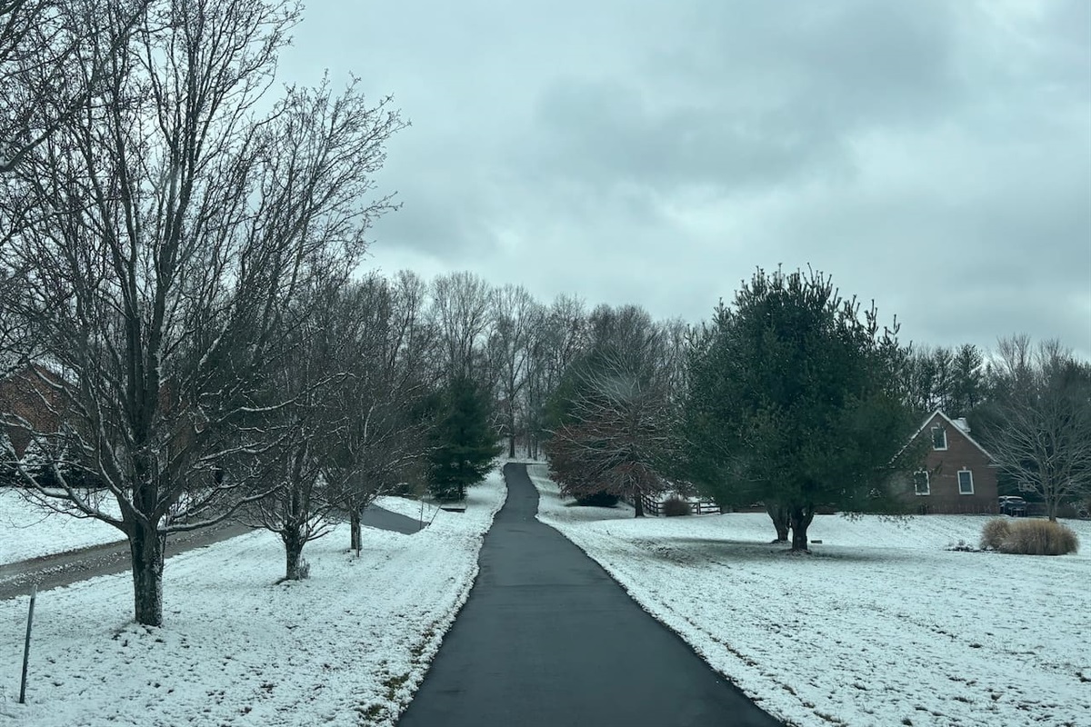The entrance of asphalted driveway.